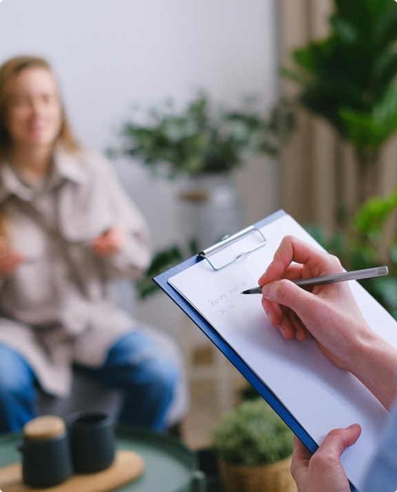A woman in a hypnotherapy session